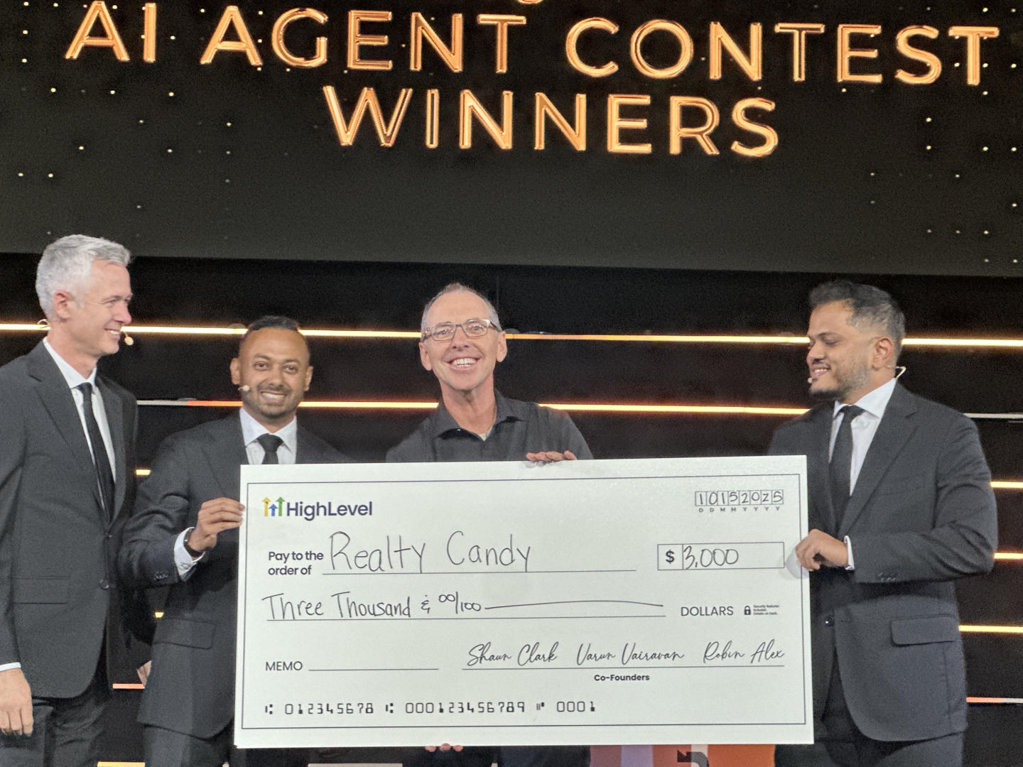 RealtyCandy team on stage with Technical Excellence award check